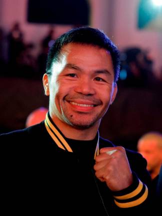 Former boxer Manny Pacquiao poses ahead of the weigh-in. REUTERSpix