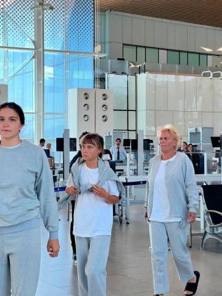 Swedish activist Greta Thunberg walks through Ramon International Airport before her deportation flight, near Eilat, Israel, after Israel intercepted the vessels of the Global Sumud Flotilla aiming to reach Gaza and break Israel’s naval blockade, October 6, 2025 in this handout image. Israel Foreign Ministry/Handout via REUTERS