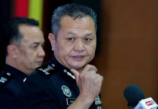 Sarawak police arrest 10 locals, seize 137 fake firearms