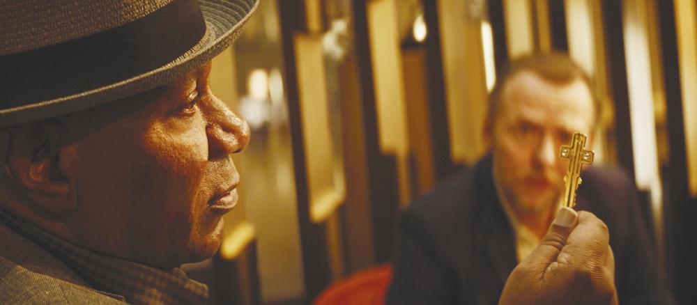 Ving Rhames holds the cross-shaped key. $!Ving Rhames holds the cross-shaped key.