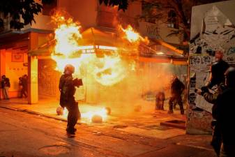 Clashes break out in Athens after march to mark 2008 student killing by police
