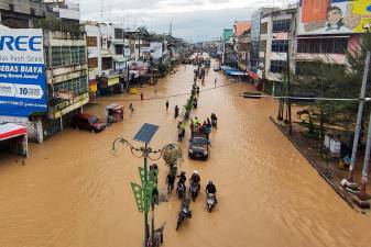 Flash flood hits Indonesia’s North Sumatra leaving 12 missing