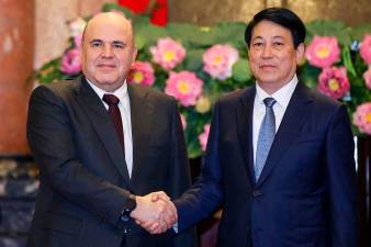 Russia PM meets Vietnam president, seeking deeper ties