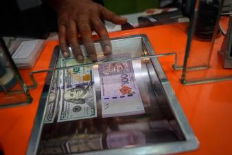 Ringgit opens higher against greenback on weaker us economic outlook, tariff concerns