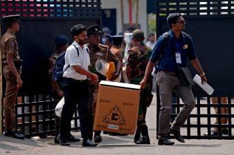 Sri Lankans vote with issues of welfare, economic reforms at stake