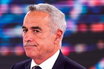 Far-right candidate surprises in Romania elections, setting up run-off with PM