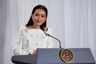 Thai PM pledges new populist measures to boost support, economy