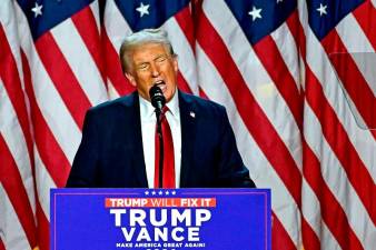 Dollar soars, bitcoin hits record, as Trump claims victory
