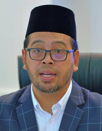 Timbalan Menteri di Jabatan Perdana Menteri (Hal Ehwal Agama) Dr Zulkifli Hasan. - fotoBERNAMA