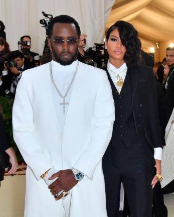 Sean Combs (L) and singer Cassie Ventura arrives for the 2018 Met Gala on May 7, 2018. AFPpix