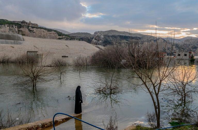 The flooding of the area for the Ilisu Dam project has erased the original town Hasankeyf that stood here for 12,000 years. — AFP