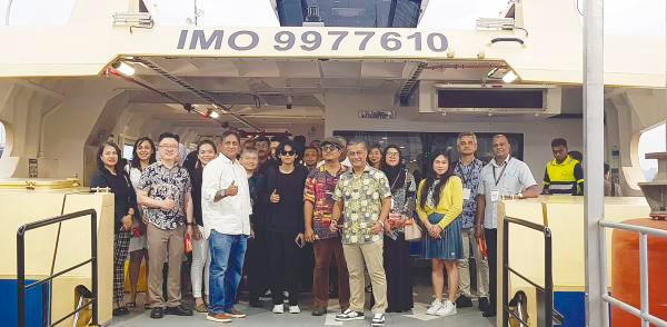 Sasedharan (fifth from left) gives the thumbs-up at the soft launch of the Penang Port’s Sunset Cruise. With him are invited guests and members of the media.