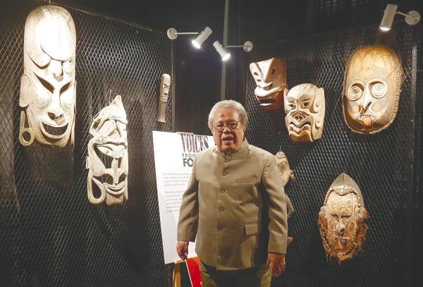 Goh with a display of face masks from various indigenous communities.
