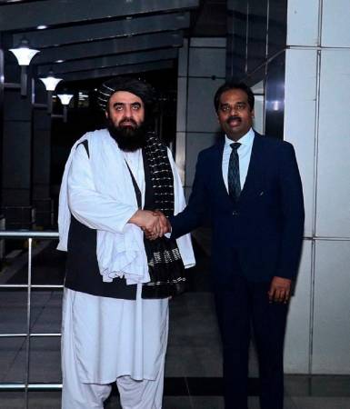 Taliban Foreign Minister Mawlawi Amir Khan Muttaqi is welcomed on his arrival at New Delhi, India October 9, 2025. - Randhir Jaiswal via X/Handout via REUTERS
