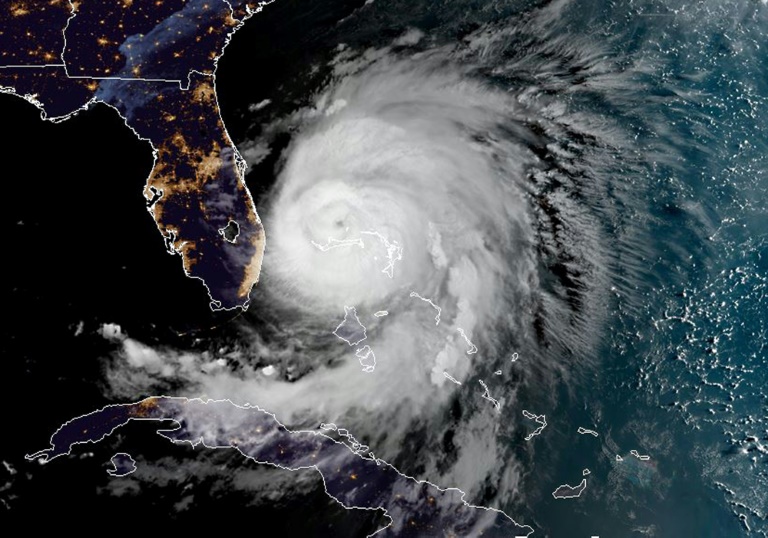 This satellite image obtained from NOAA/RAMMB Hurricane Dorian as it sits over the Bahamas. — AFP