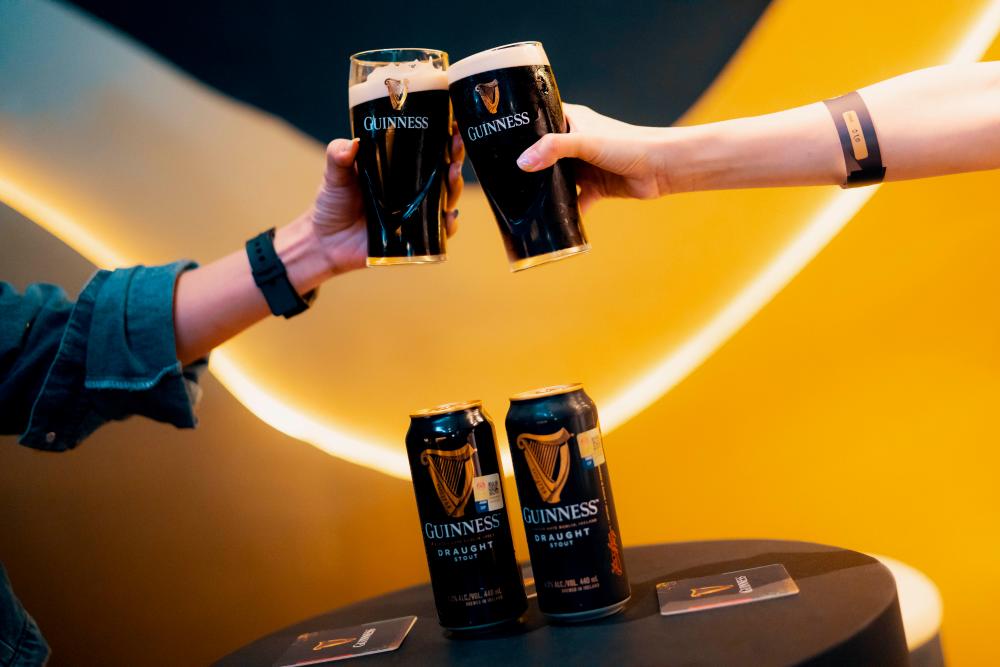 Guests cheers to smooth and creamy Guinness Draught in a Can $!Guests cheers to smooth and creamy Guinness Draught in a Can