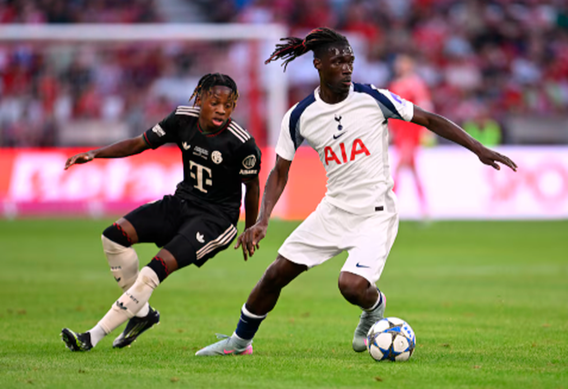 Yves Bissouma in action with Bayern Munich’s Wisdom Mike. Reuterspix