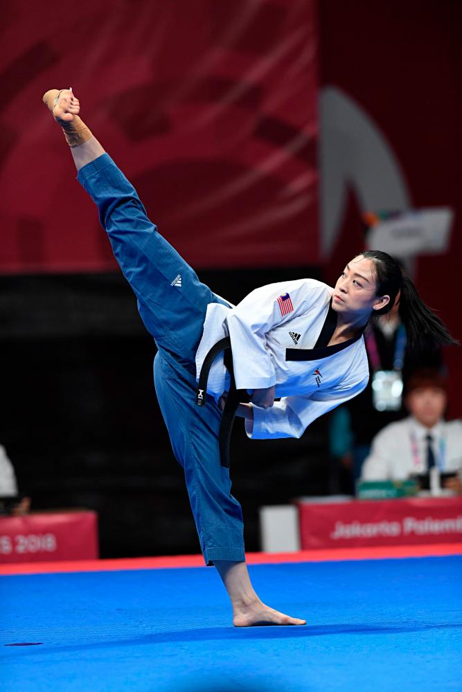 Yap performing a taekwondo move at the 18th Asian Games in Jakarta, Indonesia. - Photo courtesy of Andru Panggabean