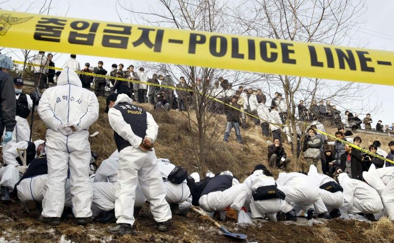 More than two million police officers were mobilised to try to identify the individual who raped and murdered women in rural parts of Hwaseong, south of Seoul. — AFP