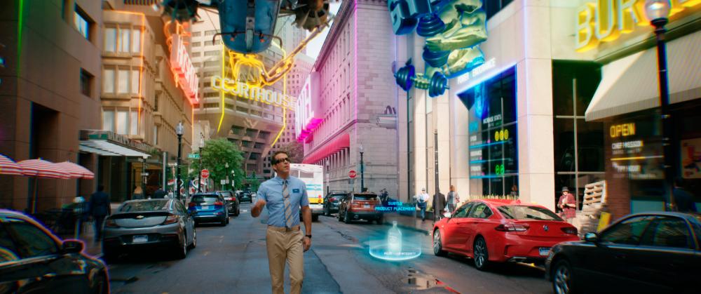 Guy roaming around Free City. Courtesy of 20th Century Studios. © 2020 Twentieth Century Fox Film Corporation. All Rights Reserved.