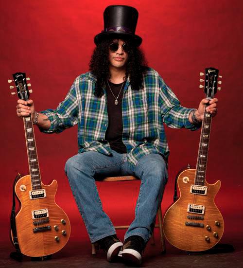 $!Slash is also recognised for playing his 1987 Les Paul Standard, which has been utilised on multiple tours. – NEIL ZLOZOWER