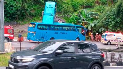 Six injured as factory bus crashes on hilly bend in Penang