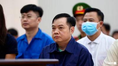 Vietnam jails six over deadly karaoke bar blaze