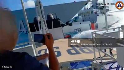 Chinese and Philippine vessels collide in South China Sea confrontation