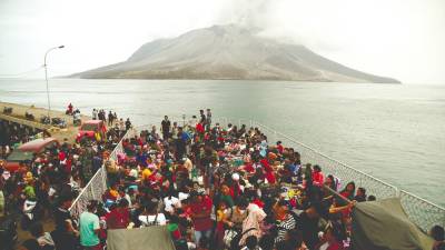 Public urged to stay indoors to reduce volcanic ash impact