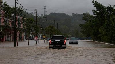 Flash flood hits Kampung Tun Sardon in Penang after heavy rain
