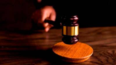 Housewife charged with 205 passports, fake MyKad in Shah Alam