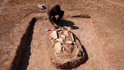 Iraq drought uncovers 40 ancient tombs in Mosul Dam reservoir