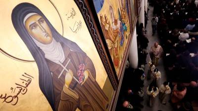 Syrian Christians attend Christmas mass for first time since fall of Assad
