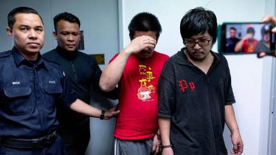 Two men charged with mischief by fire, Molotov cocktails