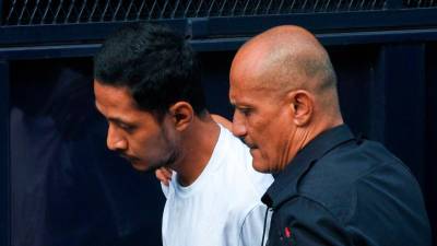 Court orders mental evaluation for teacher accused of slashing wife