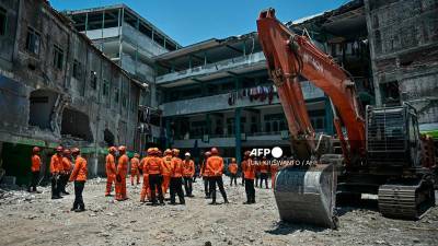 Indonesia school collapse death toll reaches 67 as search ends