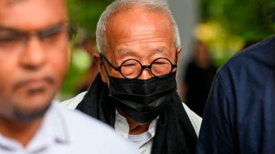 Tycoon who brought F1 to Singapore pleads guilty in graft case