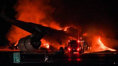 Five dead in Japan plane collision at Tokyo airport