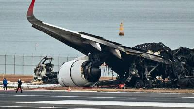 Over 300 flights canceled over Tokyo Airport collision 