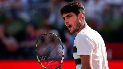 Alcaraz sets up Queen's final clash with Lehecka
