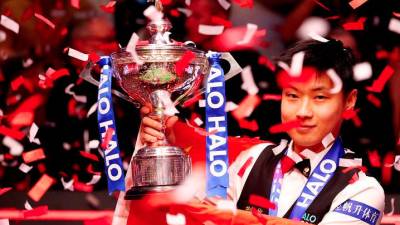 Zhao becomes China's first world snooker champion after comeback from ban