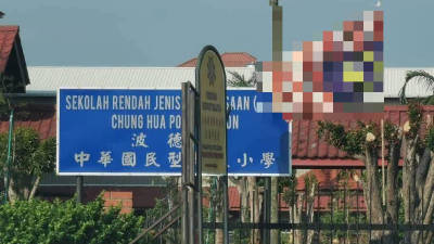 Police identify suspect in upside-down flag incident at Port Dickson school