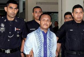 Illegal Indonesian gets death sentence for murdering bank staff, stealing RM500m