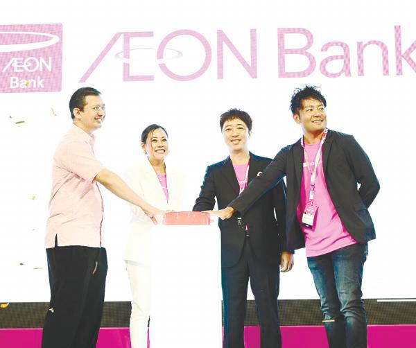 From left: Ministry of Finance Treasury secretary-general Datuk Johan Mahmood Merican, Raja Teh Maimunah, Aeon Credit Service (M) Bhd chairman Daisuke Maeda and Aeon Co (M) Bhd managing director Naoya Okada at the launch.