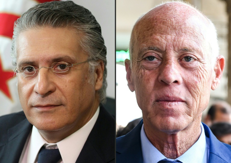 Nabil Karoui, Tunisian media magnate, on the left and independent candidate Kais Saied apeear to be leading the polls with just over a quarter of the votes counted. — AFP