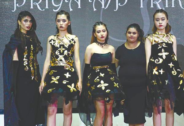 Priya (second from right) said organising the fashion show from scratch has built her confidence to interact with professionals.
