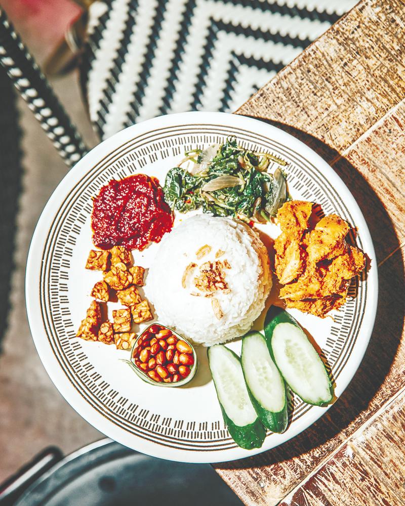 $!Tapir’s Nasi Lemak is served with hedgehog mushroom rendang, tempeh, sambal, coconut rice, peanuts and cucumber.