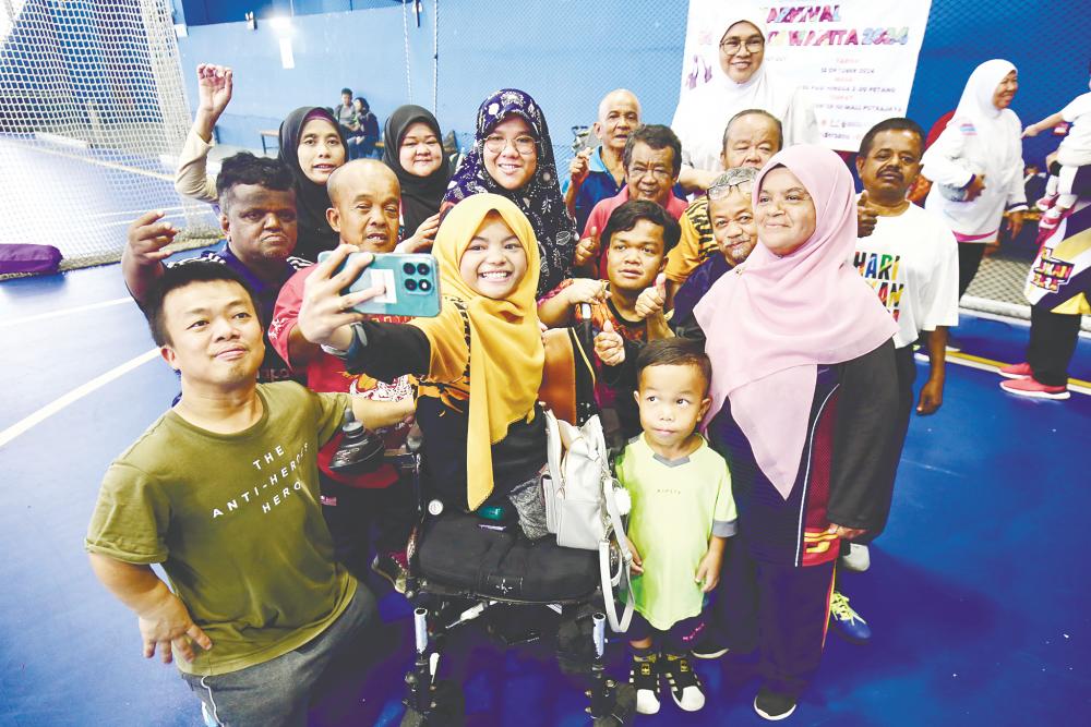 Azizah said obesity and weight issues are the major concerns for individuals with dwarfism due to their shorter stature and potential mobility limitations, which reduce their calorie needs. – ADAM AMIR HAMZAH/THESUN