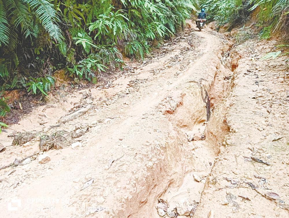 Many aid programmes for the Orang Asli villagers are hampered due to poor road conditions and the weather. – Pic courtesy of Kamal Alek