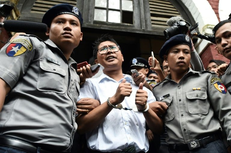 Rally to mark one year since arrest of Myanmar Reuters journalists. — AFP
